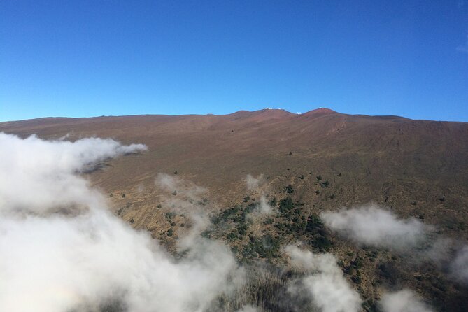 Complete Island 60-Minute Helicopter Tour - East Maui Segment: Sugar Fields, Hana Coast, and Rainforest Views