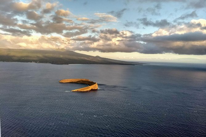 Maui Circle Island-PRIVATE-Air Tour for 2-5: Waterfalls & Lava! - Makena, lava fields, and the Haleakala base from a true-angle perspective